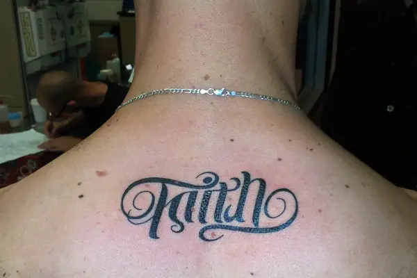Unleashing Your Creativity with Ambigram Tattoos: A Comprehensive Guide - faith trust ambigram tattoo