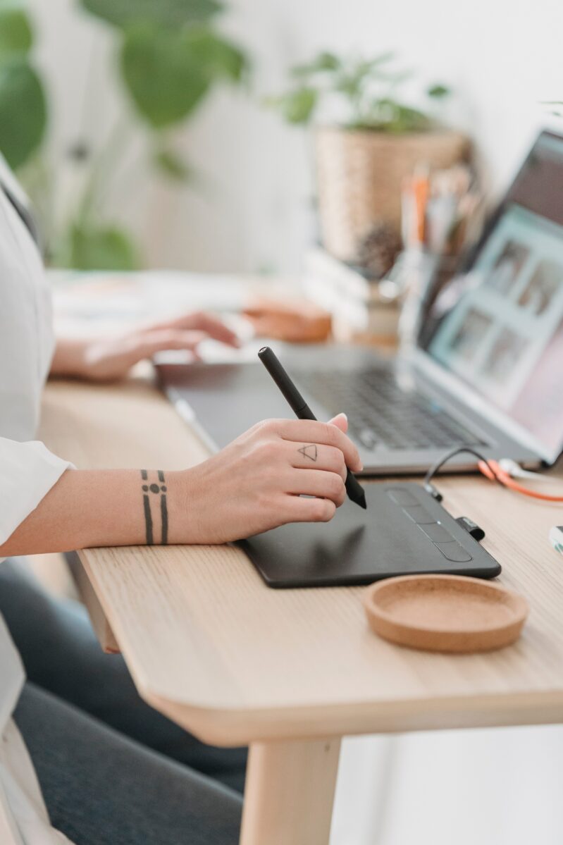 Woman using drawing tablet, article about file types
